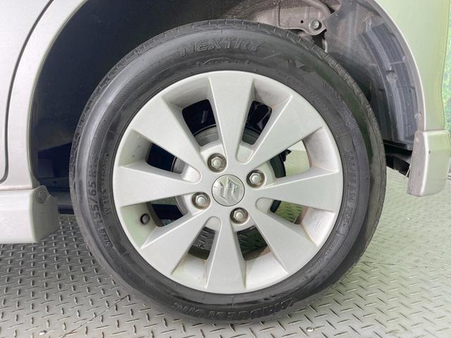 ワゴンＲ ＦＸリミテッドＩＩ　禁煙車　スマートキー　純正１４インチアルミ　オートエアコン　ＣＤ　プライバシーガラス　ドアバイザー　ヘッドライトレベライザー　シートアンダートレイ　パワーウィンドウ（27枚目）