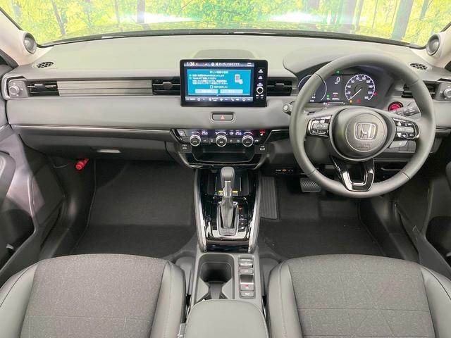 ヴェゼル ｅ：ＨＥＶ　Ｚ　全周囲カメラ　衝突被害軽減システム　レーダークルーズ　禁煙車　電動リアゲート　ハーフレザーシート　コーナーセンサー　スマートキー　ＬＥＤヘッド　ＥＴＣ２．０　純正１８インチアルミ　オートハイビーム（2枚目）