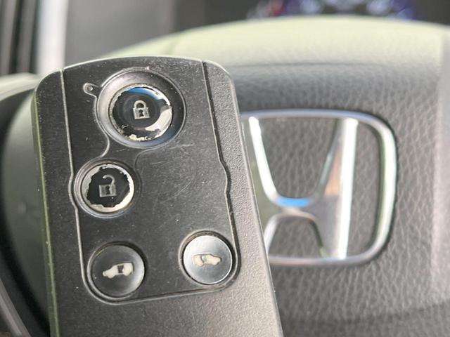 ステップワゴンスパーダ Ｚ　ＨＤＤナビエディション　純正ナビ　後席モニター　両側電動ドア　バックカメラ　禁煙車　ドラレコ　スマートキー　ＨＩＤヘッド　ビルトインＥＴＣ　純正１６インチアルミ　オートエアコン　ＣＤ　ＤＶＤ再生　地デジ　パドルシフト（53枚目）