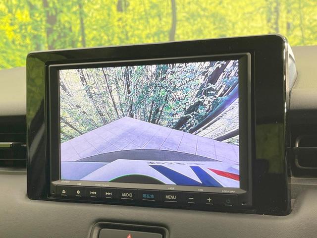 ヴェゼル ｅ：ＨＥＶ　Ｚ　純正ＳＤナビ　バックカメラ　衝突被害軽減システム　レーダークルーズ　禁煙車　ブラインドスポットモニター　電動リアゲート　ドラレコ　コーナーセンサー　スマートキー　ＬＥＤヘッド　ビルトインＥＴＣ（5枚目）