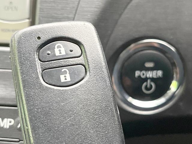 プリウス L 純正ナビ 禁煙車 スマートキー ETC 純正15インチアルミ オートライト オートエアコン CD DVD再生 地デジ ドアバイザー プライバシーガラス 盗難防止システム(7枚目)