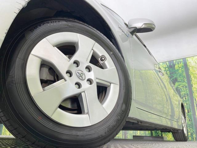 プリウス L 純正ナビ 禁煙車 スマートキー ETC 純正15インチアルミ オートライト オートエアコン CD DVD再生 地デジ ドアバイザー プライバシーガラス 盗難防止システム(13枚目)