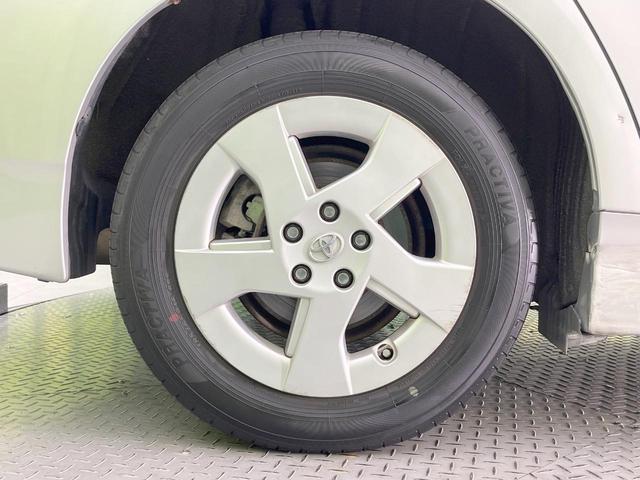 プリウス L 純正ナビ 禁煙車 スマートキー ETC 純正15インチアルミ オートライト オートエアコン CD DVD再生 地デジ ドアバイザー プライバシーガラス 盗難防止システム(28枚目)