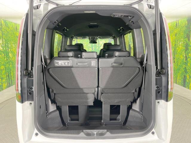 ステップワゴン スパーダ　登録済未使用車　純正１１型ナビ　両側電動スライドドア　衝突軽減装置　ＢＳＭ　バックカメラ　パワーバックドア　Ｂｌｕｅｔｏｏｔｈ再生　フルセグＴＶ　ＬＥＤヘッドライト　シートヒーター（11枚目）