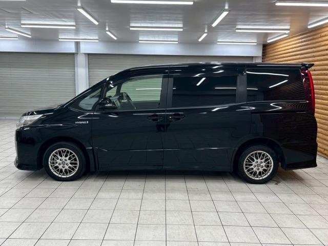 ノア ハイブリッドSi 純正ナビ/フリップダウン/両側電動パワスラ/フルセグ/ETC/バックカメラ/ステアリングリモコン/レーンキープアシスタンス/スマートキー/プッシュスタート/オートライト/フロントフォグランプ(26枚目)