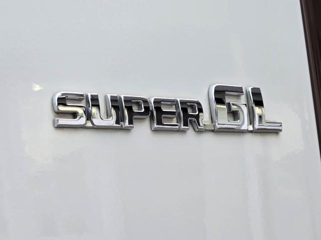 ハイエースバン スーパーＧＬ　ダークプライムＩＩ　ローダウン／ＥＳＳＥＸフロントバンパー／ＥＣ１８インチアルミ／社外リアバンパー／バッドフェイス／ドアミラーウインカー／純正７インチナビ／ＥＴＣ／Ｂカメラ／両側パワスラ／ヴァレンティテールランプ（36枚目）