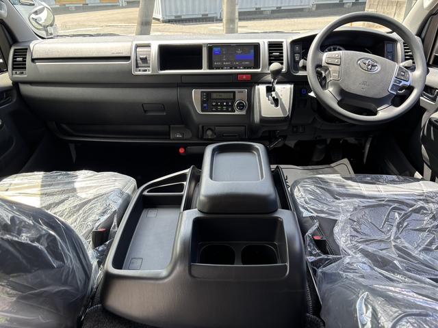 ハイエースワゴン GL 未登録新車/4WD/4列10人乗り/フリップダウンモニター/パワースライドドア/ベッド/シートカバー/床張り/ユーロボンネット/フロントリップ/ファブレス16インチアルミホイール/マッドフラップ(15枚目)