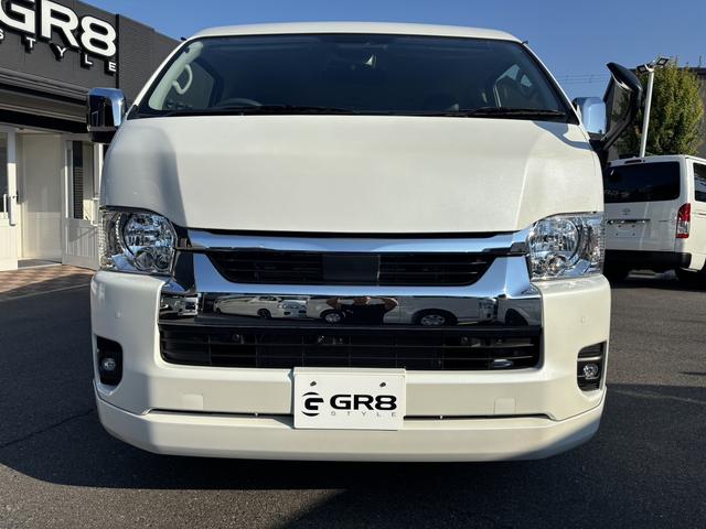 ハイエースワゴン GL 未登録新車/4WD/4列10人乗り/フリップダウンモニター/パワースライドドア/ベッド/シートカバー/床張り/ユーロボンネット/フロントリップ/ファブレス16インチアルミホイール/マッドフラップ(21枚目)