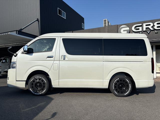 ハイエースワゴン GL 未登録新車/4WD/4列10人乗り/フリップダウンモニター/パワースライドドア/ベッド/シートカバー/床張り/ユーロボンネット/フロントリップ/ファブレス16インチアルミホイール/マッドフラップ(24枚目)