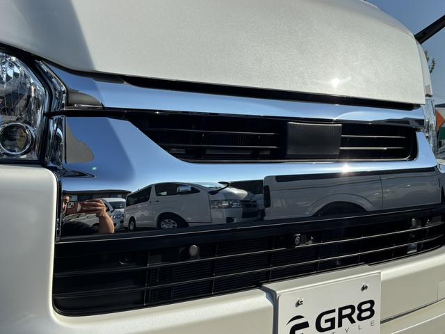 ハイエースワゴン GL 未登録新車/4WD/4列10人乗り/フリップダウンモニター/パワースライドドア/ベッド/シートカバー/床張り/ユーロボンネット/フロントリップ/ファブレス16インチアルミホイール/マッドフラップ(28枚目)