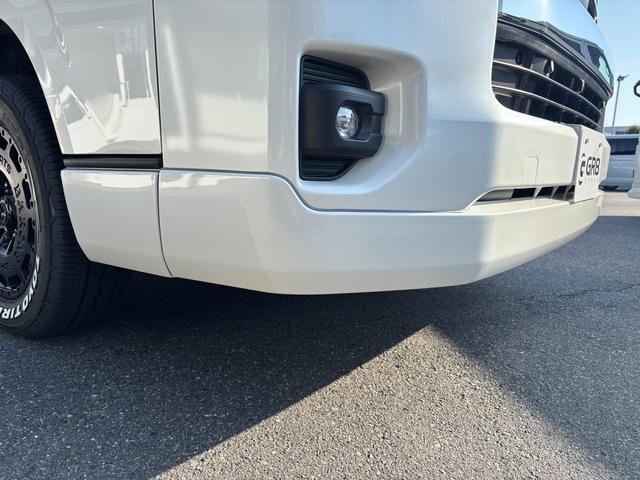 ハイエースワゴン GL 未登録新車/4WD/4列10人乗り/フリップダウンモニター/パワースライドドア/ベッド/シートカバー/床張り/ユーロボンネット/フロントリップ/ファブレス16インチアルミホイール/マッドフラップ(29枚目)