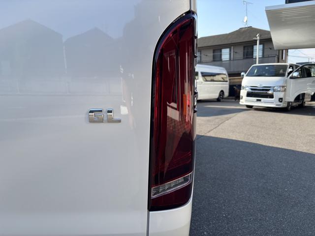 ハイエースワゴン GL 未登録新車/4WD/4列10人乗り/フリップダウンモニター/パワースライドドア/ベッド/シートカバー/床張り/ユーロボンネット/フロントリップ/ファブレス16インチアルミホイール/マッドフラップ(35枚目)