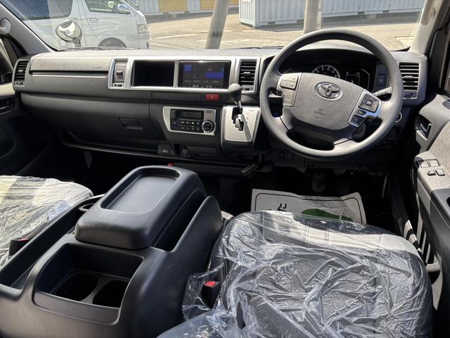ハイエースワゴン GL 未登録新車/4WD/4列10人乗り/フリップダウンモニター/パワースライドドア/ベッド/シートカバー/床張り/ユーロボンネット/フロントリップ/ファブレス16インチアルミホイール/マッドフラップ(52枚目)
