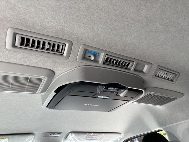 ハイエースワゴン GL 未登録新車/4WD/4列10人乗り/フリップダウンモニター/パワースライドドア/ベッド/シートカバー/床張り/ユーロボンネット/フロントリップ/ファブレス16インチアルミホイール/マッドフラップ(53枚目)