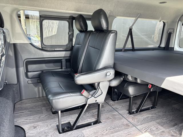 ハイエースワゴン GL 未登録新車/4WD/4列10人乗り/フリップダウンモニター/パワースライドドア/ベッド/シートカバー/床張り/ユーロボンネット/フロントリップ/ファブレス16インチアルミホイール/マッドフラップ(55枚目)
