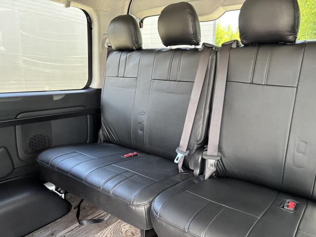 ハイエースワゴン GL 未登録新車/4WD/4列10人乗り/フリップダウンモニター/パワースライドドア/ベッド/シートカバー/床張り/ユーロボンネット/フロントリップ/ファブレス16インチアルミホイール/マッドフラップ(61枚目)