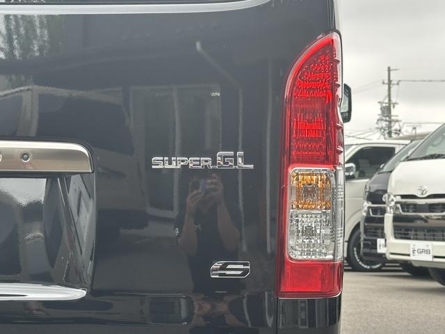 ハイエースバン ロングスーパーＧＬ　ダークプライムＳ　４ＷＤ／アルパインＢＩＧＸナビ／ＧＲ８フロントスポイラー／パワースライドドア／デジタルインナーミラー／パノラミックビューモニタ－／純正１５インチアルミホイール／専用アブソーバー／ＬＥＤヘッドライト（36枚目）