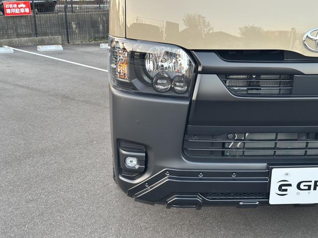 ハイエースバン ロングスーパーＧＬ　アースカラー／ＲＡＹＳアルミホイール／ＢＩＧ－Ｘ／ベッドキット／シートカバー／パノラミック／デジミラ／パワスラ／（14枚目）