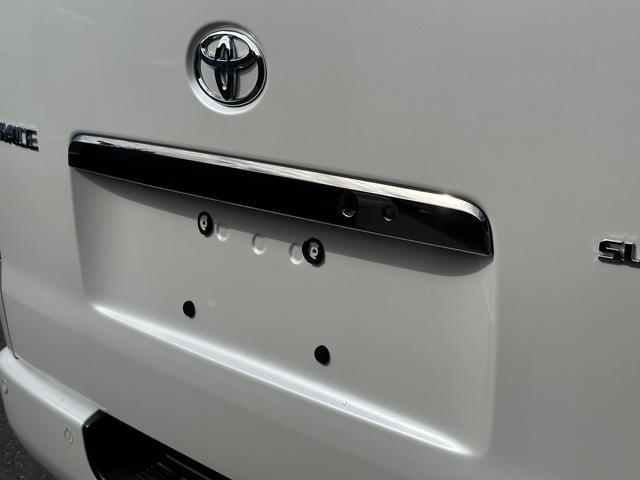 ハイエースバン スーパーＧＬ　ダークプライムＩＩ　ローダウン／寒冷地仕様／アルパインＢＩＧＸナビ／ＲＡＹＳ１６インチアルミホイール／ＧＲ８フロントスポイラー／パノラミックビューモニター／デジタルインナーミラー／センターコンソール／ベッド／スライドドア（35枚目）