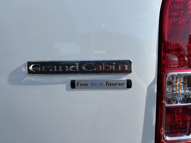 ハイエースワゴン グランドキャビン　登録済未使用車／４ＷＤ／寒冷地仕様／ファインテックツアラー／４列１０人乗り／カロッツェリアナビ／デジタルインナーミラー／パノラミックビューモニター／パワースライドドア／フォグライト（37枚目）