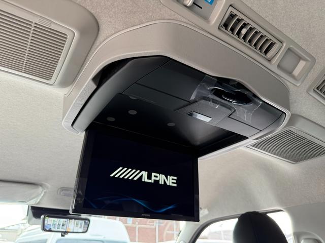 ハイエースワゴン GL 未登録新車/4WD/4列10人乗り/アルパインBIGXナビ/フリップダウンモニター/モデリスタスポイラー/16インチアルミホイール/シートカバー/パワースライドドア/パノラミックビューモニター/(3枚目)