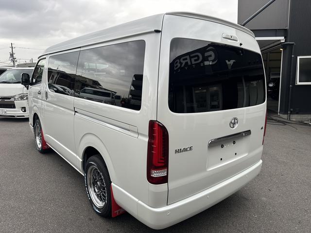 ハイエースワゴン GL 未登録新車/4WD/4列10人乗り/アルパインBIGXナビ/フリップダウンモニター/モデリスタスポイラー/16インチアルミホイール/シートカバー/パワースライドドア/パノラミックビューモニター/(12枚目)