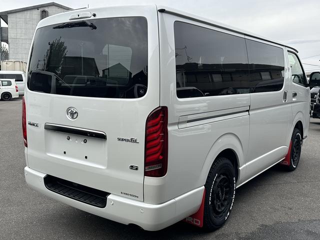 ハイエースバン ロングスーパーＧＬ　ダークプライムＳ　登録済未使用車／４ＷＤ／２０周年記念車／バッドフェイス／フロントスポイラー／アルパインＢＩＧＸナビ／ベッド（11枚目）