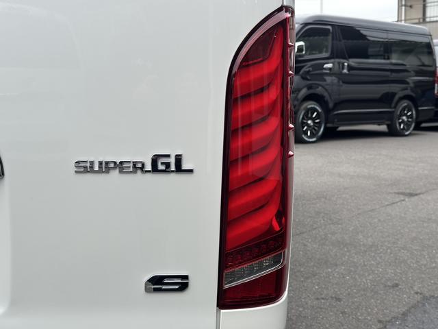 ハイエースバン ロングスーパーＧＬ　ダークプライムＳ　登録済未使用車／４ＷＤ／２０周年記念車／バッドフェイス／フロントスポイラー／アルパインＢＩＧＸナビ／ベッド（37枚目）