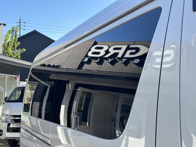 ハイエースバン ワイドスーパーＧＬ　ダークプライムＩＩ　４ＷＤ／３ナンバー／８人乗り仕様／寒冷地仕様／パワースライドドア／パノラミックビューモニター／デジタルミラー／フリップダウンモニター（35枚目）