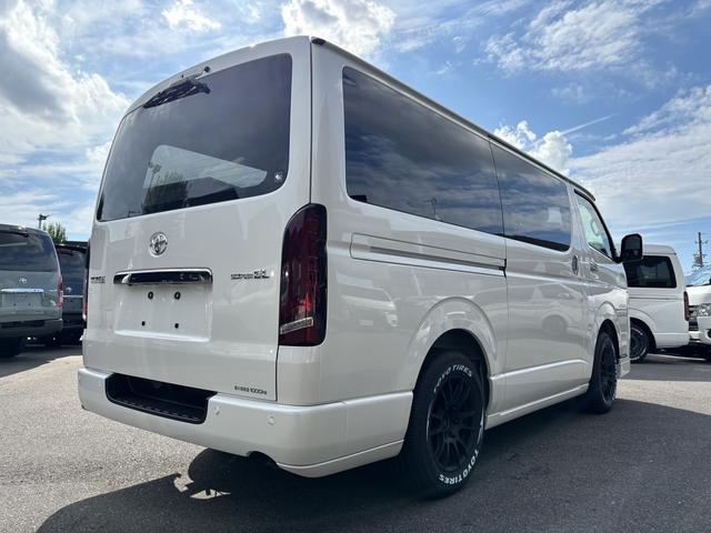 ハイエースバン スーパーＧＬ　ダークプライムＩＩ　未登録新車／ＧＲ８エアロ／レイズ１６インチアルミ／ＢＩＧ－Ｘ／フリップダウンモニター／ベッド／パワスラ／デジミラ（11枚目）