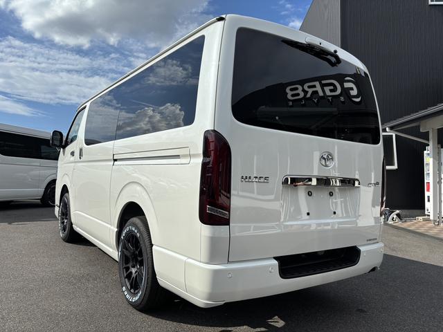 ハイエースバン スーパーＧＬ　ダークプライムＩＩ　未登録新車／ＧＲ８エアロ／レイズ１６インチアルミ／ＢＩＧ－Ｘ／フリップダウンモニター／ベッド／パワスラ／デジミラ（12枚目）