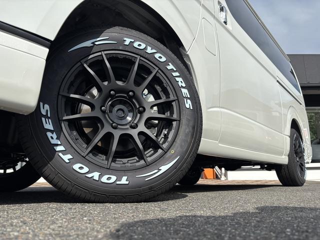 ハイエースバン スーパーＧＬ　ダークプライムＩＩ　未登録新車／ＧＲ８エアロ／レイズ１６インチアルミ／ＢＩＧ－Ｘ／フリップダウンモニター／ベッド／パワスラ／デジミラ（13枚目）