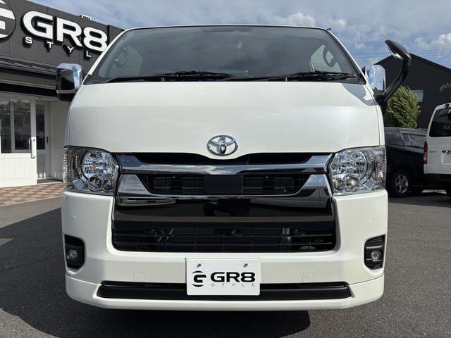 ハイエースバン スーパーＧＬ　ダークプライムＩＩ　未登録新車／ＧＲ８エアロ／レイズ１６インチアルミ／ＢＩＧ－Ｘ／フリップダウンモニター／ベッド／パワスラ／デジミラ（21枚目）