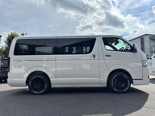 ハイエースバン スーパーＧＬ　ダークプライムＩＩ　未登録新車／ＧＲ８エアロ／レイズ１６インチアルミ／ＢＩＧ－Ｘ／フリップダウンモニター／ベッド／パワスラ／デジミラ（23枚目）