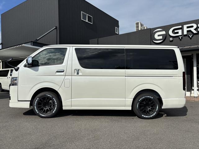 ハイエースバン スーパーＧＬ　ダークプライムＩＩ　未登録新車／ＧＲ８エアロ／レイズ１６インチアルミ／ＢＩＧ－Ｘ／フリップダウンモニター／ベッド／パワスラ／デジミラ（24枚目）
