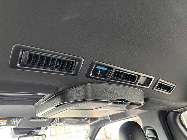 ハイエースバン スーパーＧＬ　ダークプライムＩＩ　未登録新車／ＧＲ８エアロ／レイズ１６インチアルミ／ＢＩＧ－Ｘ／フリップダウンモニター／ベッド／パワスラ／デジミラ（49枚目）