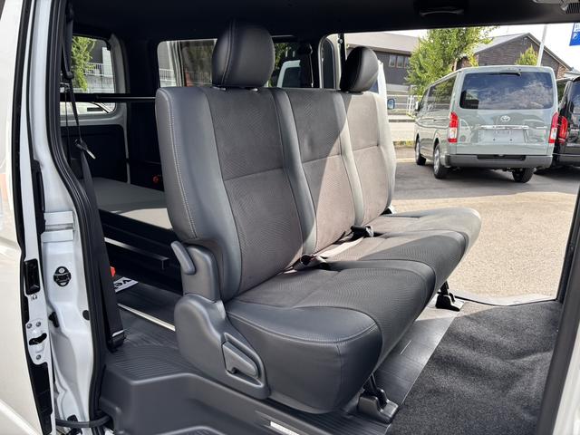 ハイエースバン スーパーＧＬ　ダークプライムＩＩ　未登録新車／ＧＲ８エアロ／レイズ１６インチアルミ／ＢＩＧ－Ｘ／フリップダウンモニター／ベッド／パワスラ／デジミラ（51枚目）