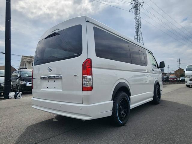 ハイエースワゴン GL 登録済未使用車/メモリーナビTV/HDMIポート/フリップダウンモニター/デジタルインナーM/パノラミックビューM/パワスラ/GR8フルエアロ/17inアルミ/ラプター塗装オーバーフェンダー/ベッド(11枚目)