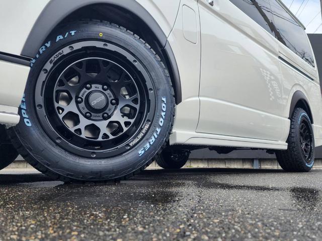 ハイエースワゴン GL 登録済未使用車/メモリーナビTV/HDMIポート/フリップダウンモニター/デジタルインナーM/パノラミックビューM/パワスラ/GR8フルエアロ/17inアルミ/ラプター塗装オーバーフェンダー/ベッド(14枚目)