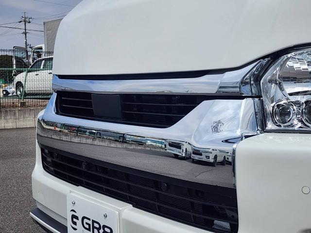 ハイエースワゴン GL 登録済未使用車/メモリーナビTV/HDMIポート/フリップダウンモニター/デジタルインナーM/パノラミックビューM/パワスラ/GR8フルエアロ/17inアルミ/ラプター塗装オーバーフェンダー/ベッド(29枚目)