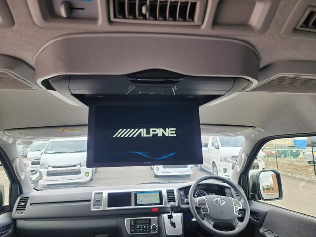 ハイエースワゴン GL 登録済未使用車/メモリーナビTV/HDMIポート/フリップダウンモニター/デジタルインナーM/パノラミックビューM/パワスラ/GR8フルエアロ/17inアルミ/ラプター塗装オーバーフェンダー/ベッド(54枚目)