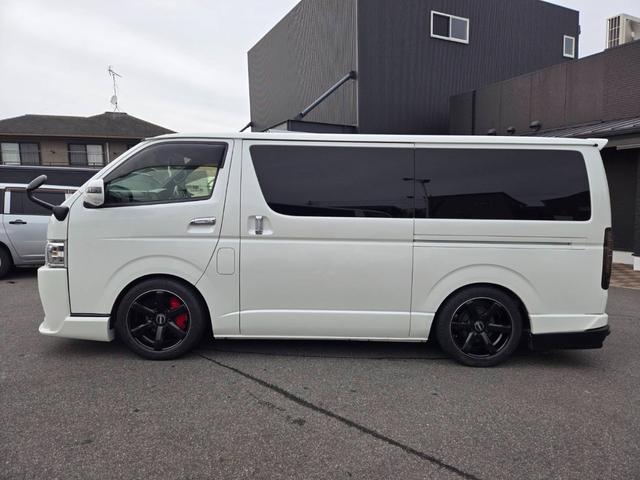 ハイエースバン スーパーＧＬ　ダークプライムＩＩ　ローダウン／１ナンバー／ＥＳＳＥＸフロントバンパー／１８インチアルミホイール／バッドフェイス／ドアミラーウインカー／ＧＲ８コンソール／シートカバー／両側パワースライドドア／ヴァレンティテール／（24枚目）