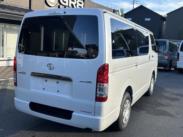 ハイエースバン スーパーＧＬ　ダークプライムＩＩ　未登録新車／アルパインＢＩＧＸシンプルモデルナビ／センターコンソール／ベッドキット／シートカバー／シフトノブ／両側パワースライドドア／デジタルインナーミラー／パノラミックビューモニター（11枚目）