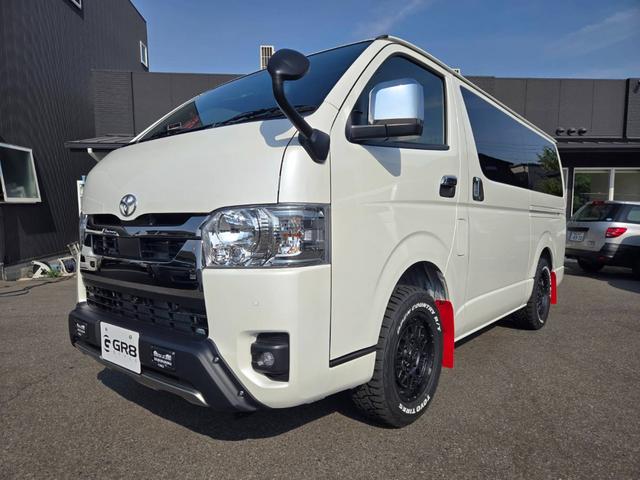 ハイエースバン スーパーＧＬ　ダークプライムＩＩ　未登録新車／４ＷＤ／ＢＩＧ－Ｘ／ＧＲ８Ｃコンソール／ベッド／ＴＲＤＦスポイラー／泥除け／ＲＴタイヤ／パワスラ（10枚目）