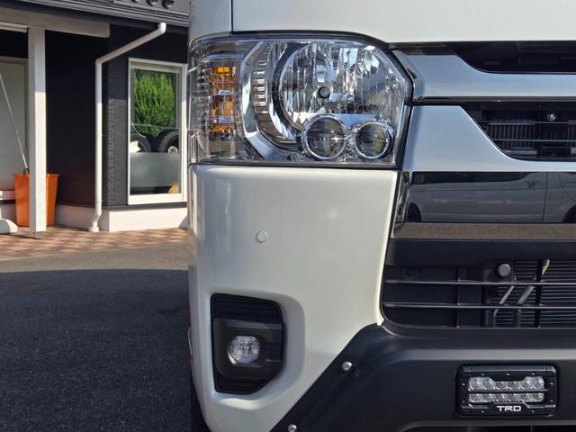 ハイエースバン スーパーＧＬ　ダークプライムＩＩ　未登録新車／４ＷＤ／ＢＩＧ－Ｘ／ＧＲ８Ｃコンソール／ベッド／ＴＲＤＦスポイラー／泥除け／ＲＴタイヤ／パワスラ（14枚目）