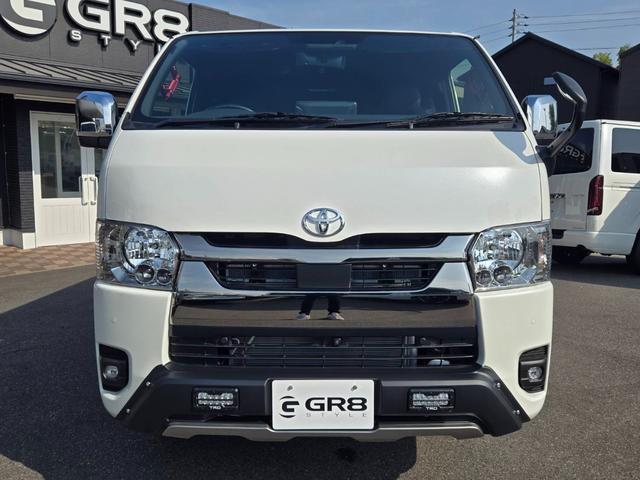 ハイエースバン スーパーＧＬ　ダークプライムＩＩ　未登録新車／４ＷＤ／ＢＩＧ－Ｘ／ＧＲ８Ｃコンソール／ベッド／ＴＲＤＦスポイラー／泥除け／ＲＴタイヤ／パワスラ（21枚目）