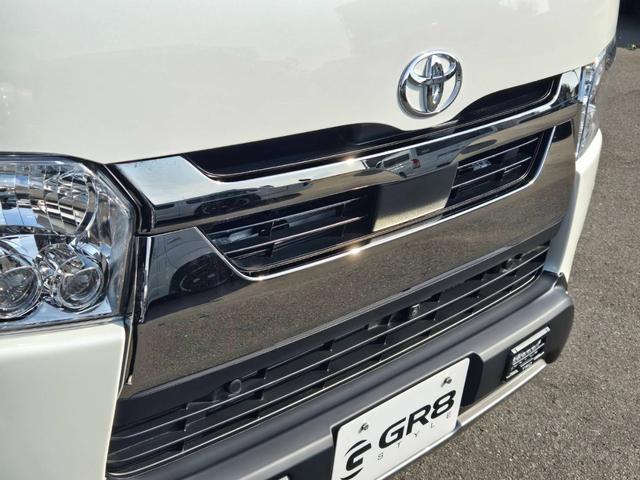 ハイエースバン スーパーＧＬ　ダークプライムＩＩ　未登録新車／４ＷＤ／ＢＩＧ－Ｘ／ＧＲ８Ｃコンソール／ベッド／ＴＲＤＦスポイラー／泥除け／ＲＴタイヤ／パワスラ（28枚目）