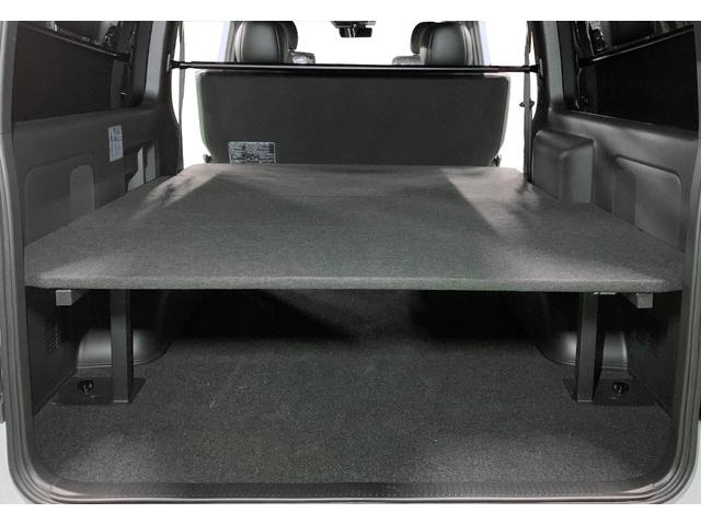 ハイエースバン スーパーＧＬ　ダークプライムＩＩ　未登録新車／４ＷＤ／ＢＩＧ－Ｘ／ＧＲ８Ｃコンソール／ベッド／ＴＲＤＦスポイラー／泥除け／ＲＴタイヤ／パワスラ（65枚目）