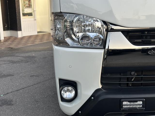 ハイエースバン スーパーＧＬ　リラクベース　タイプＩＩ　４ＷＤ／寒冷地仕様／バッドフェイス／デイライト付フロントスポイラー／１６インチアルミホイール／ＡＴタイヤ（14枚目）