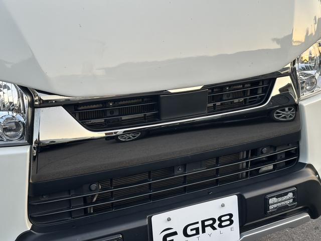 ハイエースバン スーパーＧＬ　リラクベース　タイプＩＩ　４ＷＤ／寒冷地仕様／バッドフェイス／デイライト付フロントスポイラー／１６インチアルミホイール／ＡＴタイヤ（30枚目）